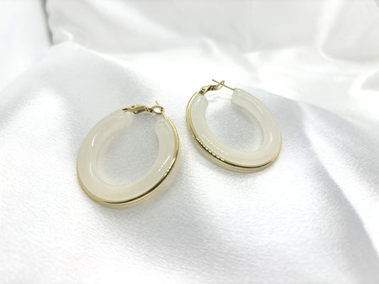 Boucles d’oreilles chics et durables en forme d’anneau avec bord doré 