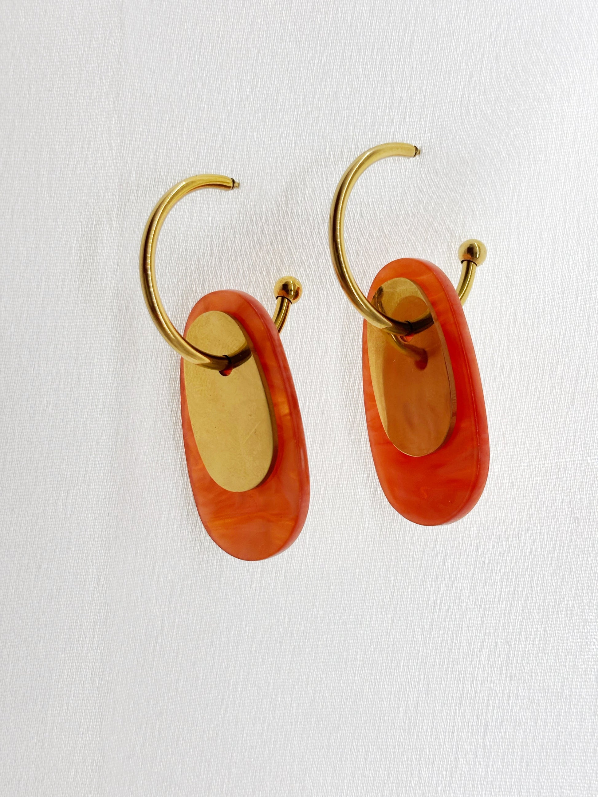 Créoles orange doré acier inoxydable femme avec pendentifs ovales orange et dorés élégants