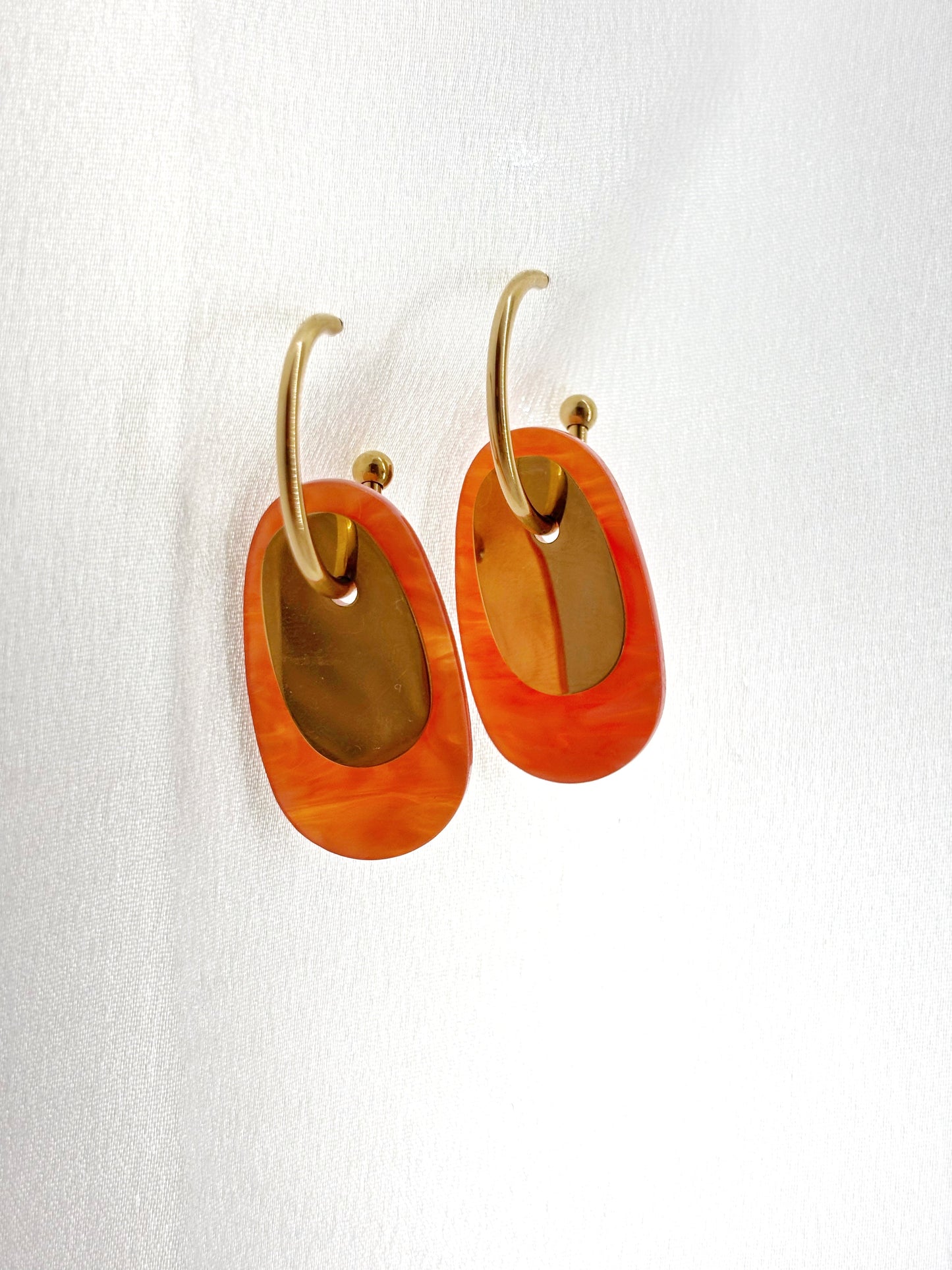 Boucles d'oreilles créoles orange doré acier inoxydable femme élégantes et modernes